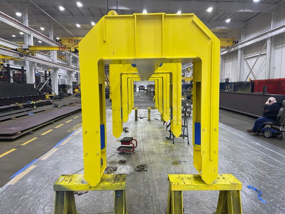 Perspective view of large industrial frames after blasting and painting