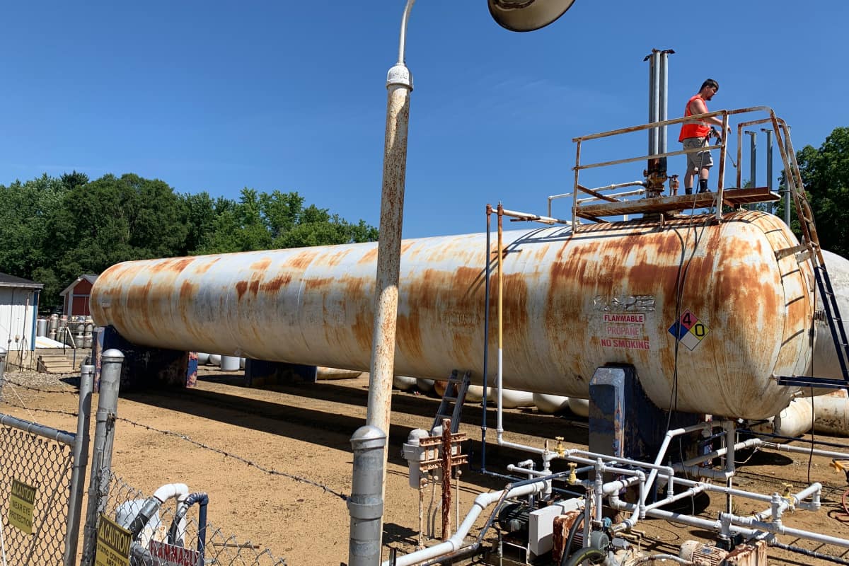 Storage tank before sandblasting by Markley's Precision